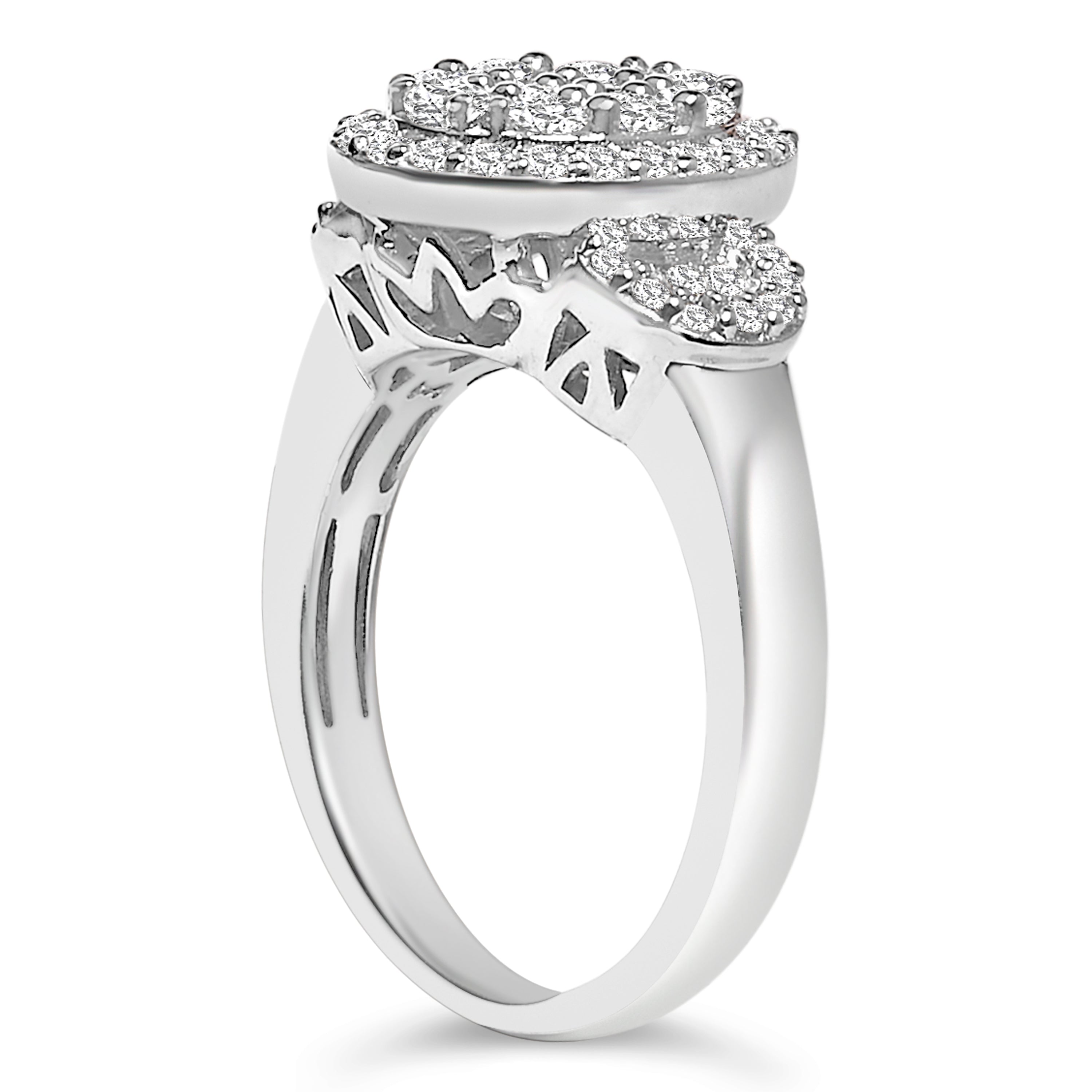 Silver ring with diamond accents on a white background