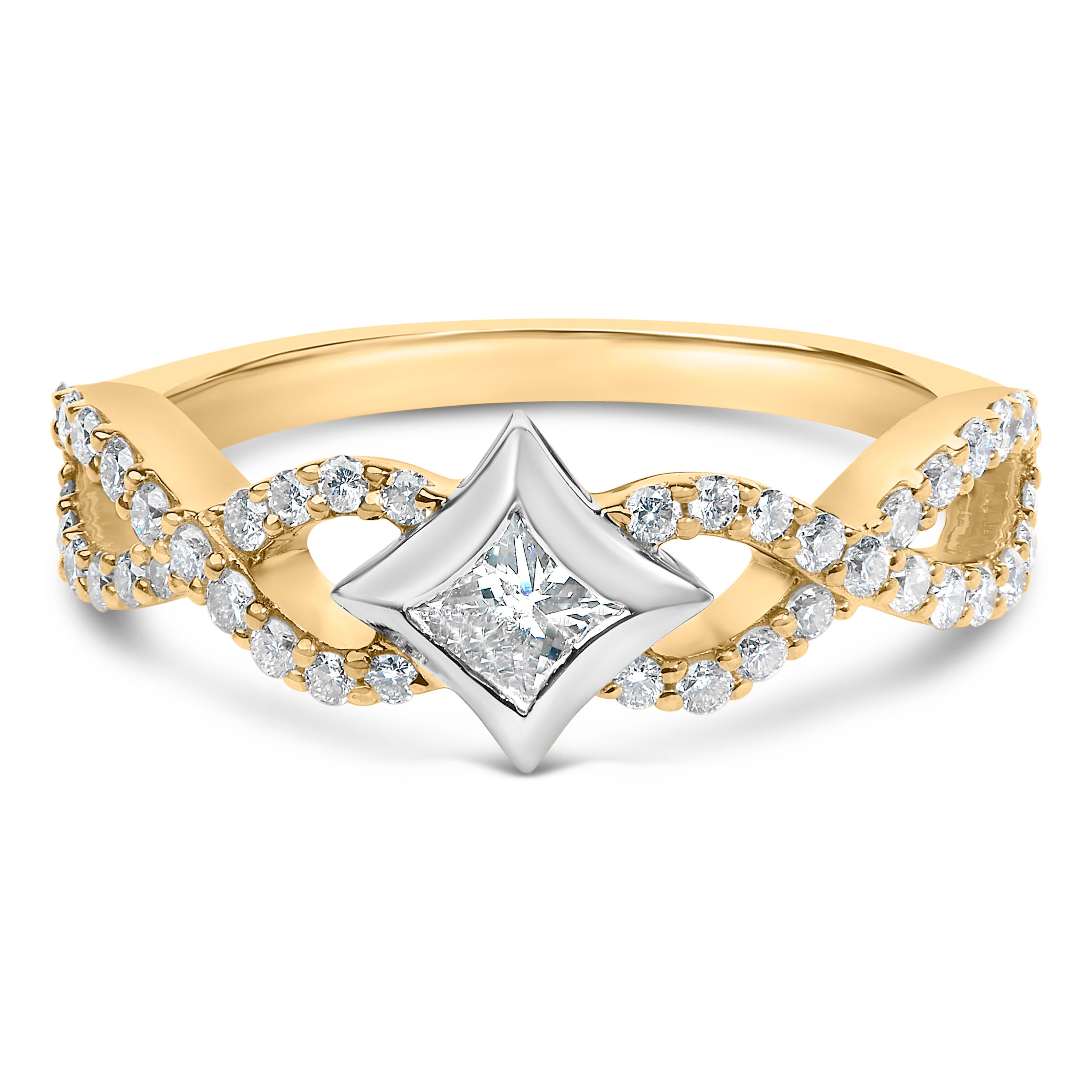Gold and silver ring with diamond accents on a white background