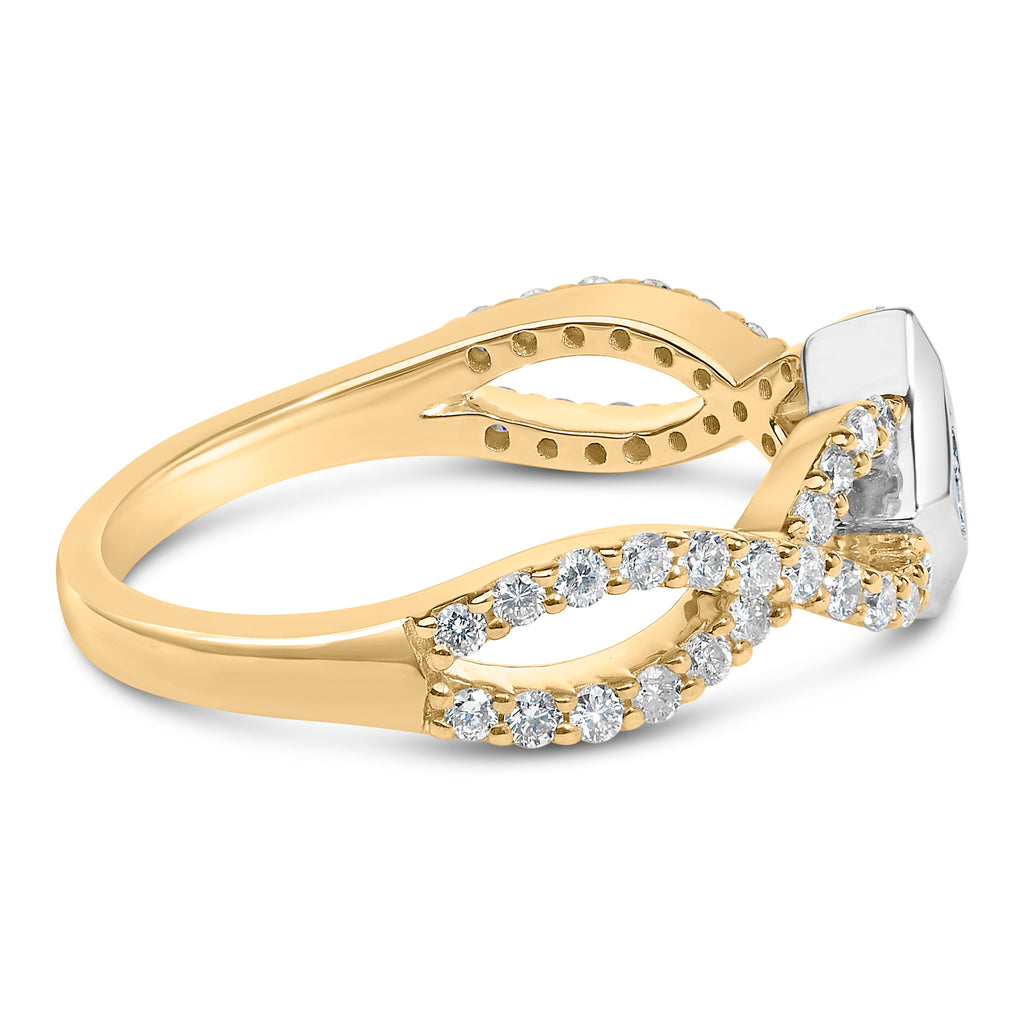 Gold ring with diamond accents on a white background