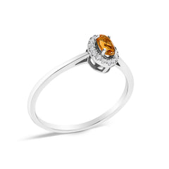 10K White Gold 5X3MM Oval Orange Citrine and Diamond Accent Halo Ring (I-J Color, I1-I2 Clarity) - Ring Size 6.5