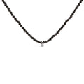 Black beaded necklace with a silver clasp on a white background