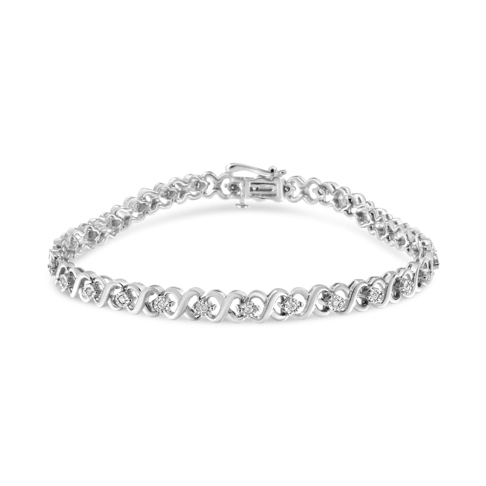 Silver bracelet with clear stones on a white background