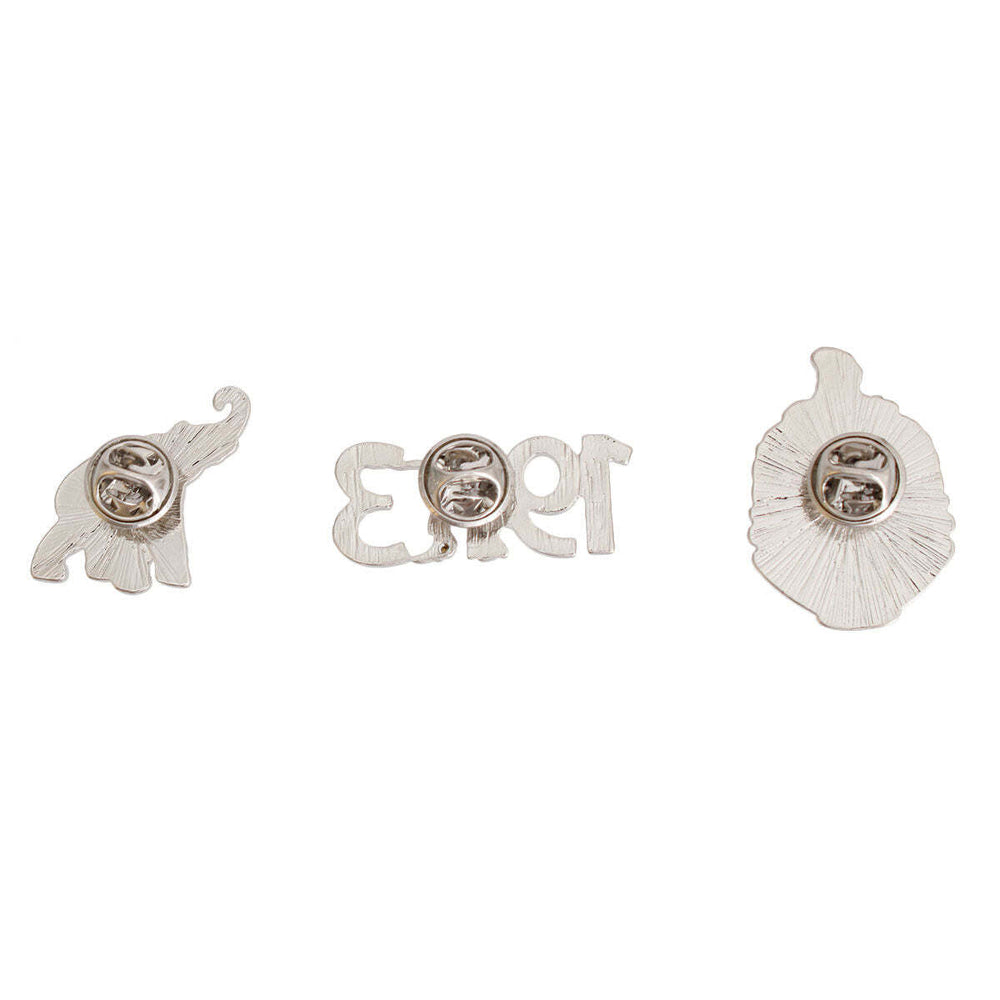 Set of three silver earrings on a white background