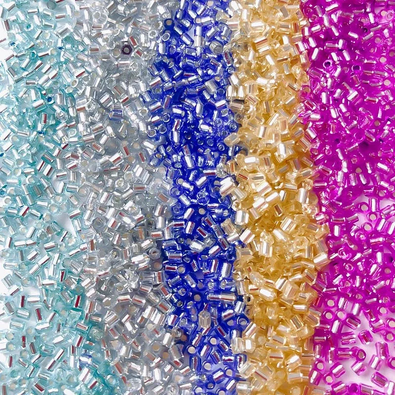 Close-up of colorful beads arranged in a pattern.