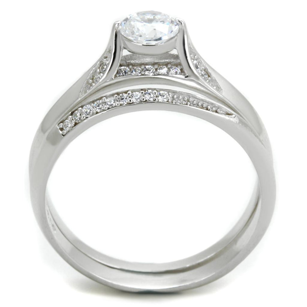 Silver ring with a diamond on a white background