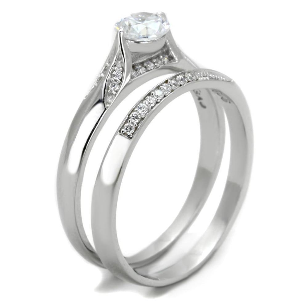 Silver ring with a diamond on a white background